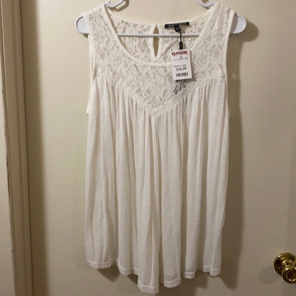 White sleeveless top with lace detail